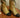 Bota Chanel CC Logo Dourada